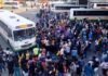 Will taxi fares go up after the fuel hike? SANTACO asks government to intervene Commuters gather around a bus at a terminal during a previous taxi strike