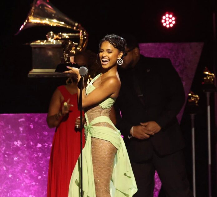 South African singer Tyla accepts her Grammy 2024 Best African Performance award for 'Water'.