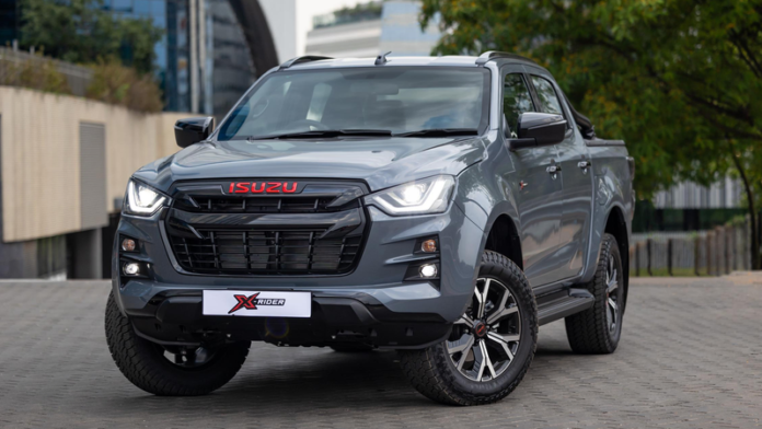 Parked outside a block of office block building, Isuzu D-Max X-Rider exudes style and reliability.