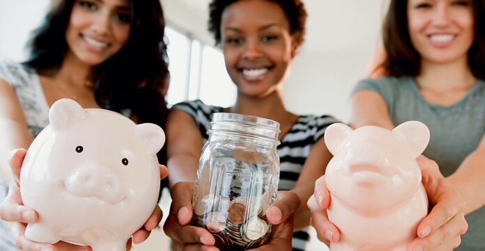 Women holding saving containers with coins