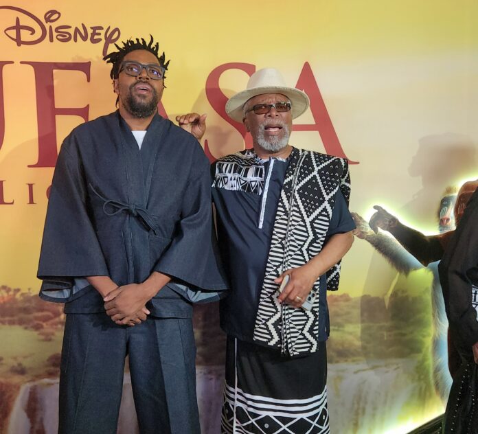 South African comedian Kagiso Lediga and Dr John Kani at the Johannesburg premiere of the 2014 film Mufasa: The Lion King