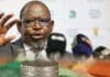 Finance Minister to announce fuel levy decision ahead of May price surge Finance Minister Enoch Godongwana at a media briefing discussing South African fuel levy decisions and fiscal policy.