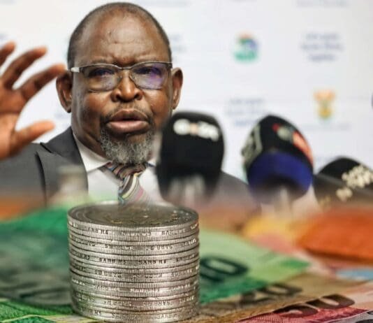 Finance Minister to announce fuel levy decision ahead of May price surge Finance Minister Enoch Godongwana at a media briefing discussing South African fuel levy decisions and fiscal policy.