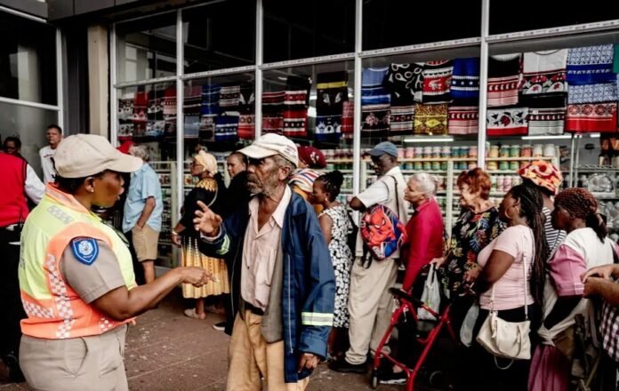 SASSA beneficiaries queue at a retailer, confidently accessing grants