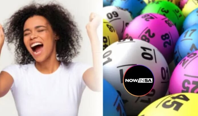 A woman celebrates joyfully next to colorful lottery balls displaying numbers, symbolising lottery results and big wins.