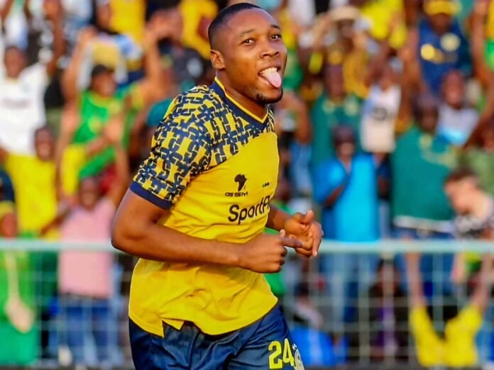 Clement Mzize celebrates a goal for Young Africans SC during a league match.