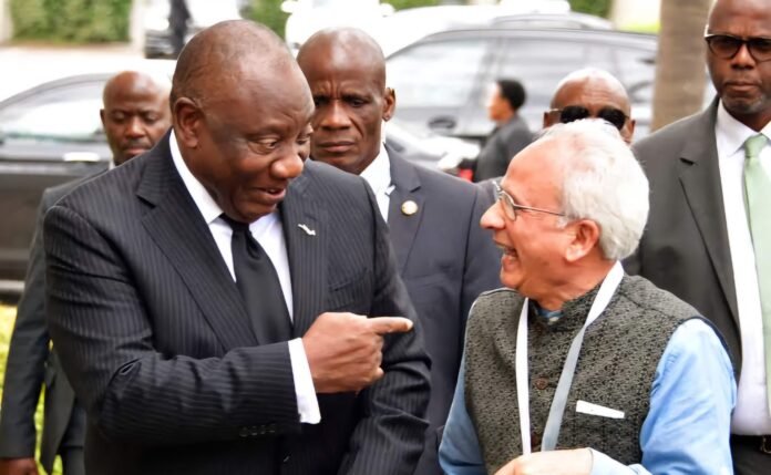 President Cyril Ramaphosa laughs with Prof Firoz Cachalia