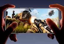 Why HONOR 400 Pro is the go-to phone for creators and influencers Hands holdingan HONOR 400 PRO displaying a detailed first-person shooter game scene.