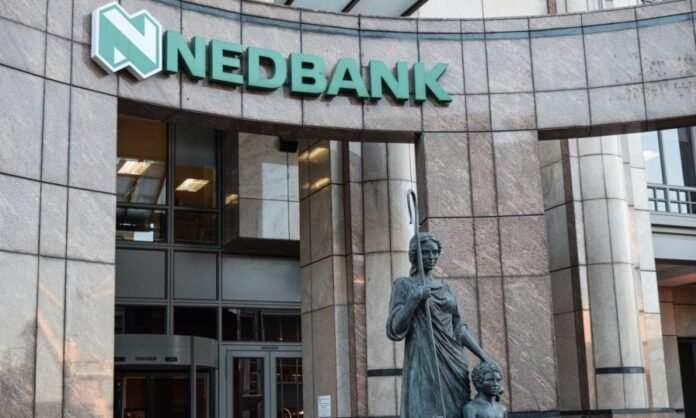 Nedbank building entrance with statue in front.
