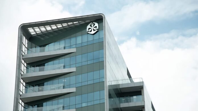 Old Mutual headquarters building with company logo.