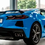 Blue Corvette Stingray rear view with quad exhausts