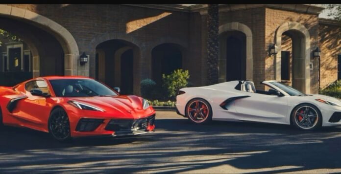 Two classic red and white Chevrolet Corvette Stingrays