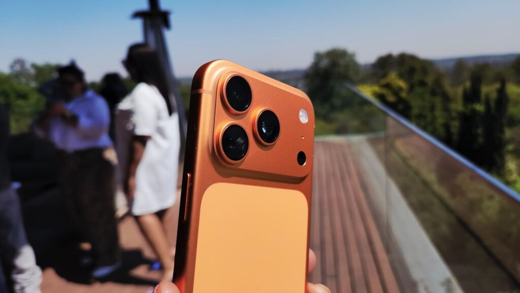 Orange iPhone 17 Pro Max triple camera close-up