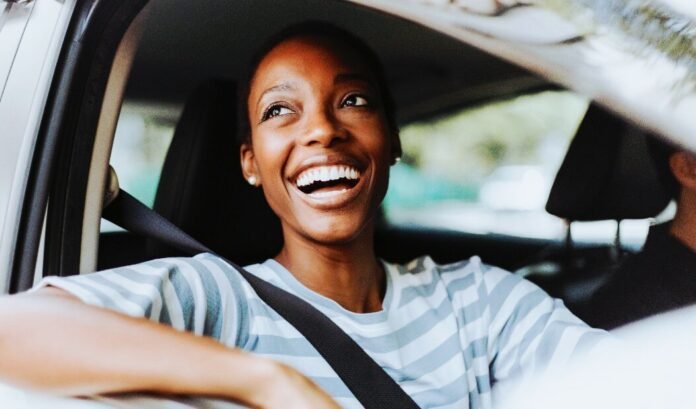 Female driver smiling