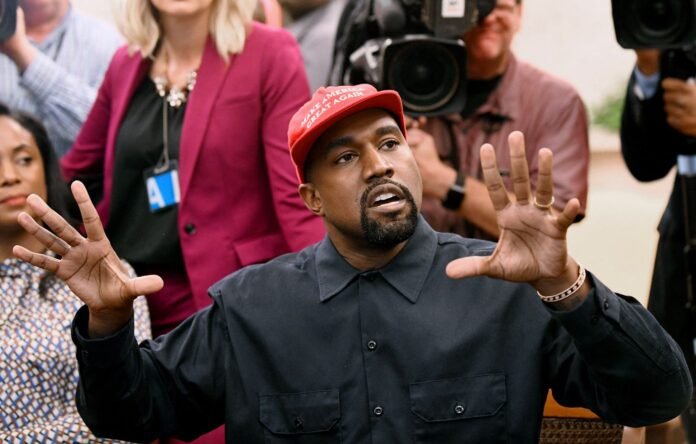 Kanye-West-2018-Oval-Office-White-House Kanye West gesturing at a press conference.