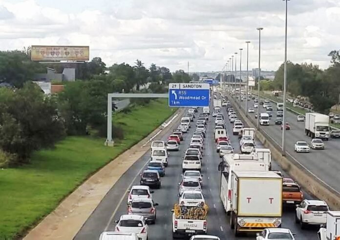 Heavy traffic toward Sandton on a congested highway.