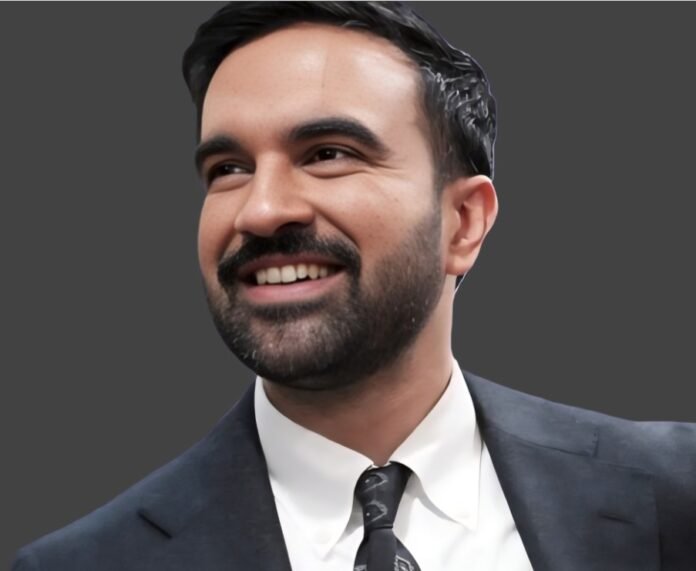 Zohran Mamdani, New York’s incoming mayor, smiling in a suit.