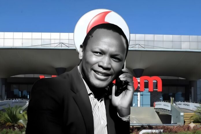 Nkosana Makate holding a phone outside Vodacom headquarters.