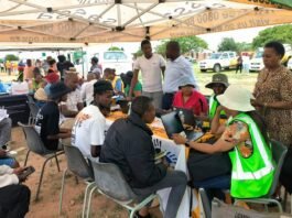 SRD April payments resume — avoid this common delay now SASSA officials assist beneficiaries during an outreach programme where grant updates and verification support are processed.