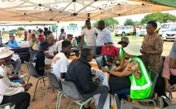 SRD April payments resume — avoid this common delay now SASSA officials assist beneficiaries during an outreach programme where grant updates and verification support are processed.