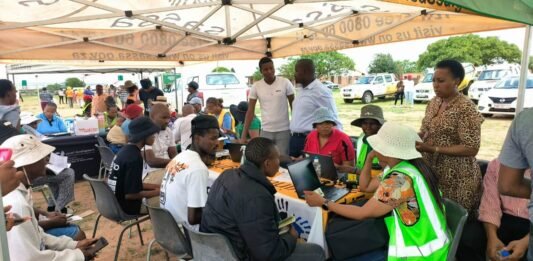 SRD April payments resume — avoid this common delay now SASSA officials assist beneficiaries during an outreach programme where grant updates and verification support are processed.