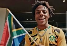 iShowSpeed in South Africa: Challenges ‘fear narrative’ with heartfelt love letter to Mzansi IShowSpeed smiling and holding a South African flag while wearing a Springboks rugby jersey in Cape Town