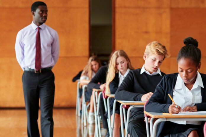 Digital illustration of matric learners writing an exam under an invigilator in a South African classroom.