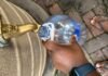 Tshwane steps up efforts to restore safe water in Bronkhorstspruit Resident filling a plastic bottle with water from a storage tank.