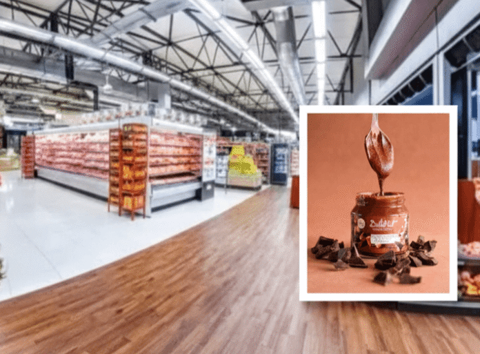 ButtaNutt peanut butter recall image inside South African supermarket.