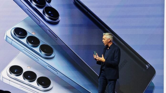 Justine Hume presenting the Galaxy S26 Ultra at the global Galaxy Unpacked South Africa event, with large visuals of the phone behind him.