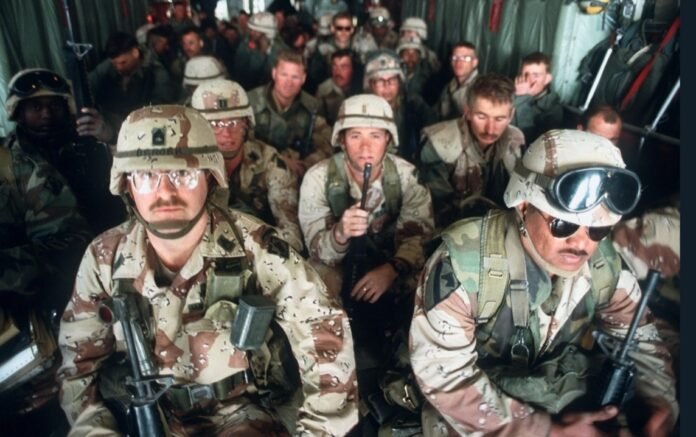 US paratroopers aboard a C-130 aircraft during Operation Desert Storm, 1991.
