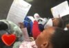 When does SASSA pay Children’s Grants in July 2026? Why the payment date shifted Caregiver holding SASSA Child Support Grant documents during grant application and verification process in South Africa