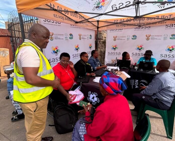 SASSA officials assisting residents with social grant enquiries during a mobile outreach activation in eNgcobo, Eastern Cape.