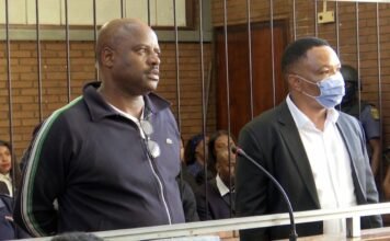 Ekurhuleni city manager in court as Tshwane CFO faces tender fraud case Julius Mkhwanazi (left) and Kagiso Lerutla (right) in the Boksburg Magistrate's Court dock on 20 April 2026. The court postponed their bail hearing to April 23, 2026.