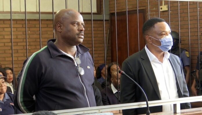 Julius Mkhwanazi (left) and Kagiso Lerutla (right) in the Boksburg Magistrate's Court dock on 20 April 2026. The court postponed their bail hearing to April 23, 2026.