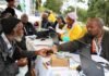 SASSA adds fourth August payment day: Who gets paid on August 7? SASSA officials assist residents with grant applications and identity verification at a community outreach in Ngudwini, KZN.