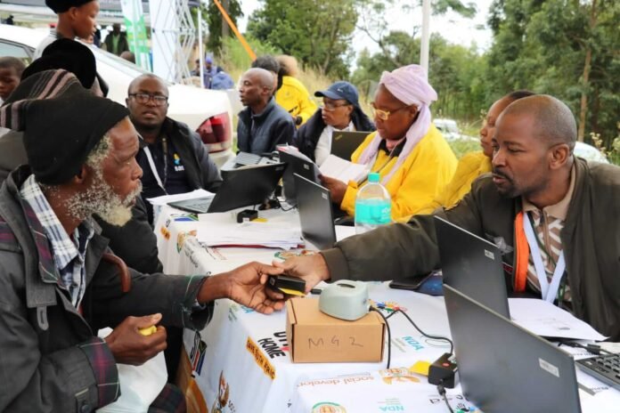 Social Development Minister Nokuzola Sisisi Tolashe engaging with community members and SASSA beneficiaries during a service delivery outreach in Ngudwini, KwaZulu-Natal.