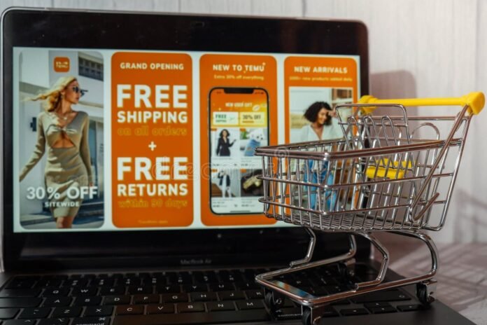 Temu laptop checkout with miniature trolley for South African online shopping