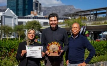 V&A academy wins global recognition for youth unemployment impact V&A Waterfront team holding certificate and trophy after V&A Academy wins Gold for local economic benefit in Cape Town.
