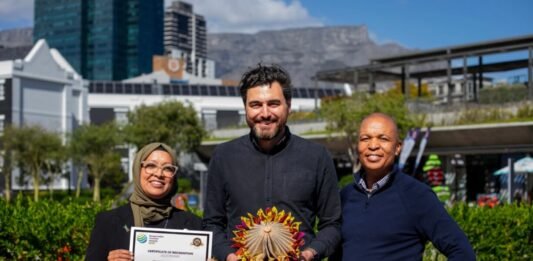 V&A academy wins global recognition for youth unemployment impact V&A Waterfront team holding certificate and trophy after V&A Academy wins Gold for local economic benefit in Cape Town.