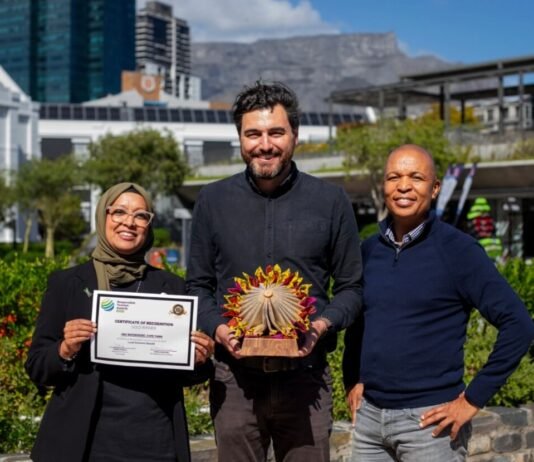 V&A academy wins global recognition for youth unemployment impact V&A Waterfront team holding certificate and trophy after V&A Academy wins Gold for local economic benefit in Cape Town.