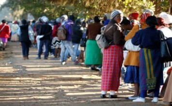 ZEP holders can apply for permanent residency in South Africa — no auto approval Zimbabweans queue outside a Home Affairs office in Harare to apply for passports.