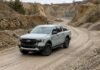 2026 Ford Everest Tremor South Africa: Price & off-road specs A light-grey Ford Ranger Tremor navigating a winding quarry dirt track to demonstrate the platform capability shared with the upcoming 2026 Ford Everest Tremor.