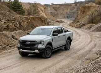2026 Ford Everest Tremor South Africa: Price & off-road specs A light-grey Ford Ranger Tremor navigating a winding quarry dirt track to demonstrate the platform capability shared with the upcoming 2026 Ford Everest Tremor.