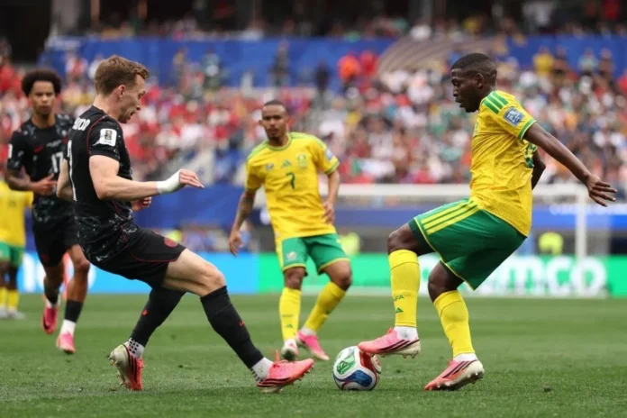 Khuliso Mudau controls the ball for Bafana Bafana during the FIFA World Cup 2026 Round of 32 match against Canada.