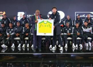 Bafana count hours to Monday takeoff after visa bungle that could see them miss Mexico opener President Ramaphosa holds framed Bafana jersey at World Cup send-off.