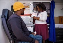 Gauteng rolls out Lenacapavir HIV prevention injection at 133 clinics Gauteng Lenacapavir HIV prevention injection rollout: healthcare worker and patient in Soweto mobile clinic.