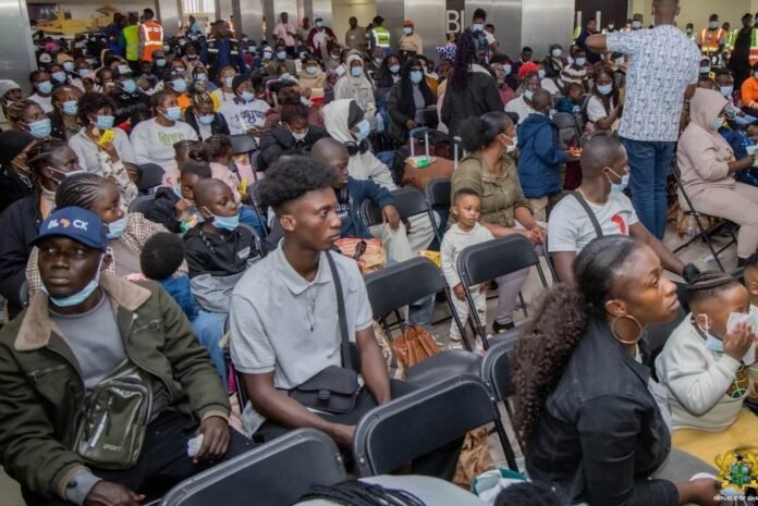Ghanaian nationals wait at OR Tambo Airport before boarding voluntary repatriation flights to Ghana.