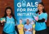 Banyana Banyana and Stayfree score against period poverty through Goals 4 Pads Two Goals 4 Pads female campaign representatives hold Stayfree sanitary pad packs beside a large campaign banner at the launch event in Johannesburg