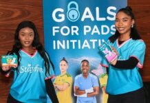 Banyana Banyana and Stayfree score against period poverty through Goals 4 Pads Two Goals 4 Pads female campaign representatives hold Stayfree sanitary pad packs beside a large campaign banner at the launch event in Johannesburg